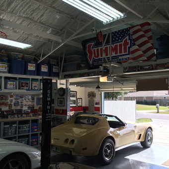 Organized Garage with Car Lift and Corvette - Vander's Vettes from Panama City, FL