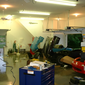 Organized garage with car lifts and tool cabinets - Mike Ross from Waynesville, OH