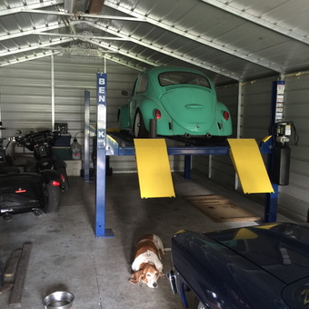 Classic Car Lift and Motorcycles in Metal Garage - Ron from Saint Johns, FL
