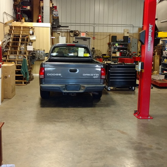 Organized garage with tool chests, car lift, and workbenches - Jay from Pembroke, Massachusetts
