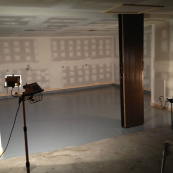 Unfinished garage with epoxy floor and work lights - i c e b l u e from Peoria, Illinois