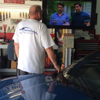 Organized Garage With Workbench, Tools, TV, and Blue Corvette - Vander's Vettes from Panama City, FL