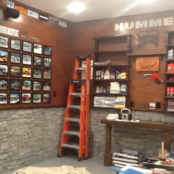 Organized garage with Hummer decor, tools, and supplies - RALPH from DANBURY, CONN