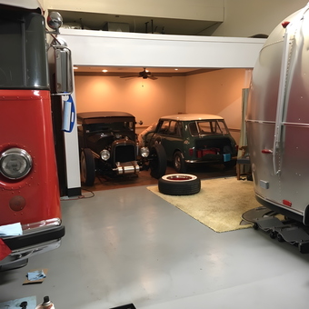 Classic Cars in Organized Garage With Spare Tire - Shadow 13 from Pasadena, California
