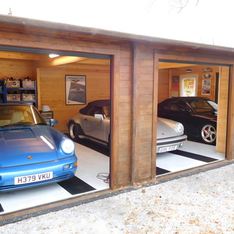 Triple Car Wooden Garage with Shelving and Porsche Signs - Sean from Rochester, Kent