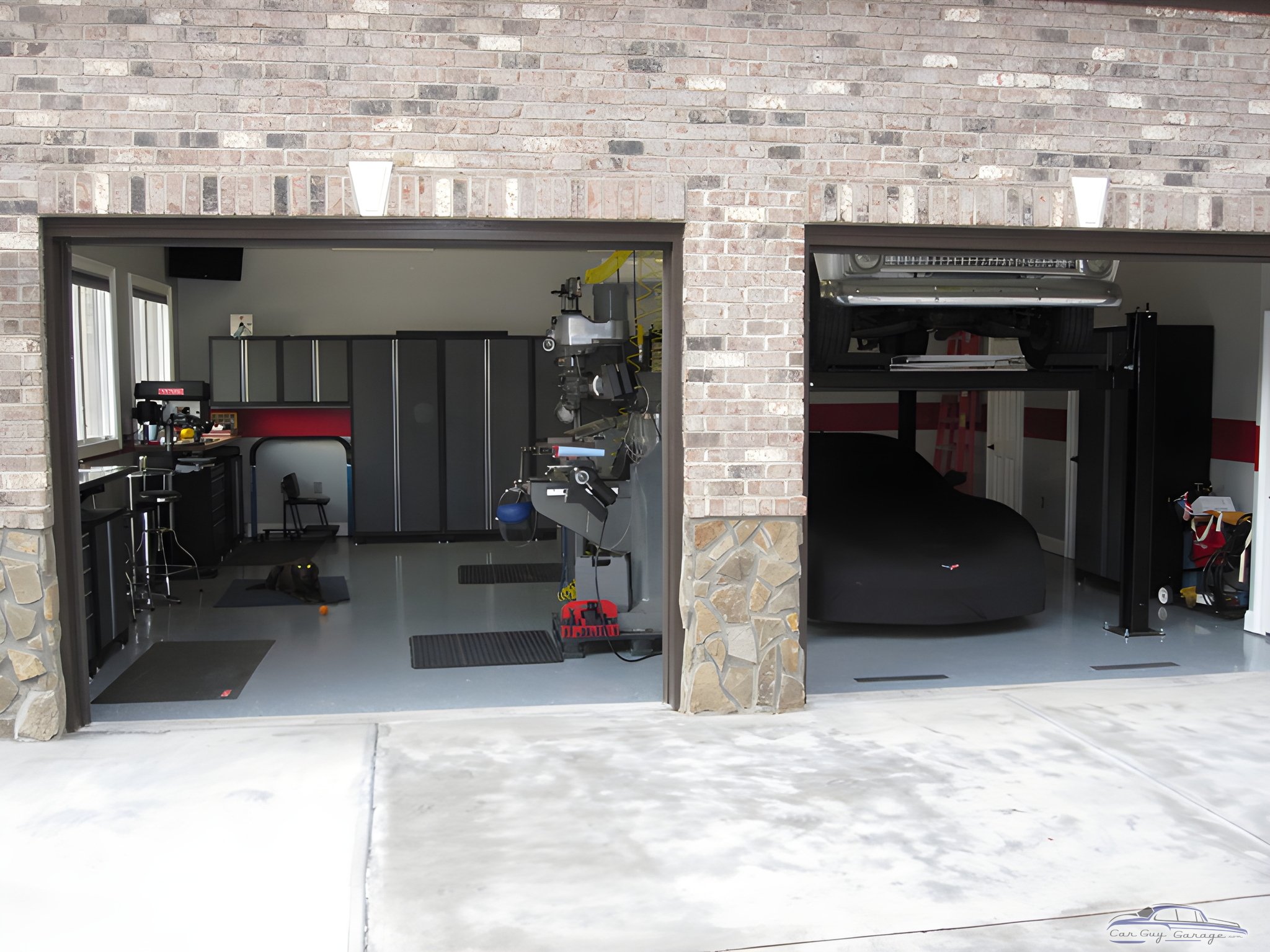 Organized garage with storage cabinets and car lift - David from Charlotte, NC