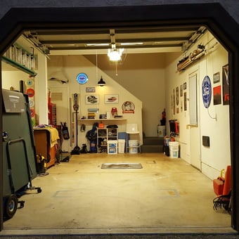 Organized garage with wall decor and storage shelves - Hoop from El Dorado Hills, Ca
