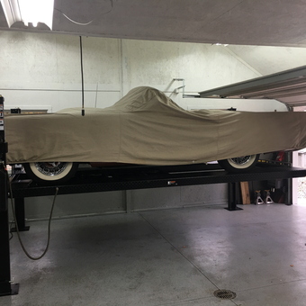 Car Lift with Covered Classic Car in Garage - MyThunder from Southington, Ct