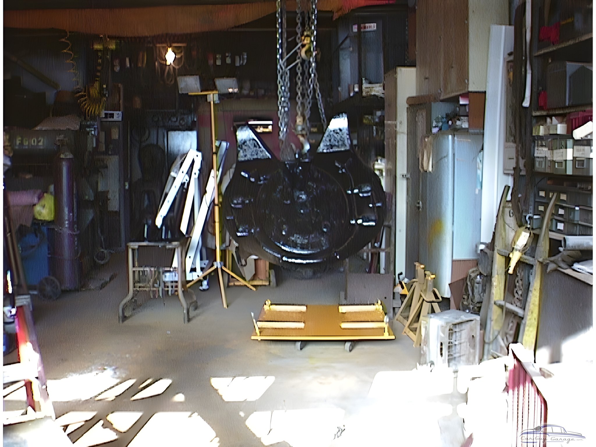 Workshop With Chain Hoist, Ladders, and Storage Shelves - John Donkersloot from Clifton, New Jersey