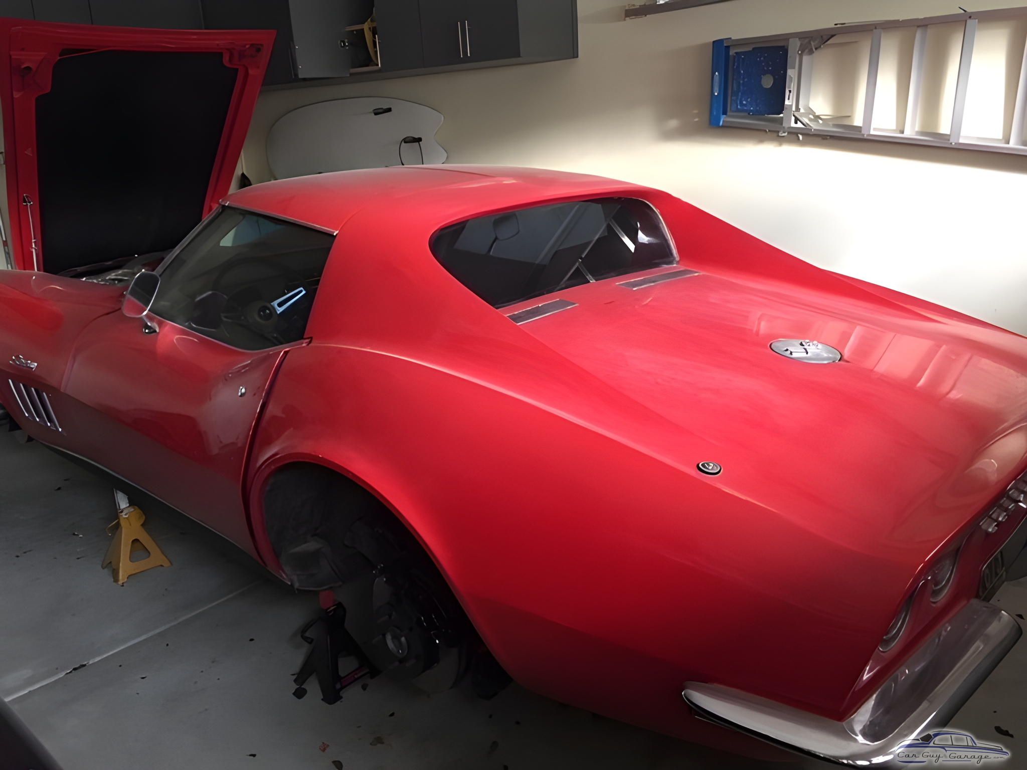 Classic Red Corvette on Jack Stands in Garage - DK69Vette from Oceanside, CA