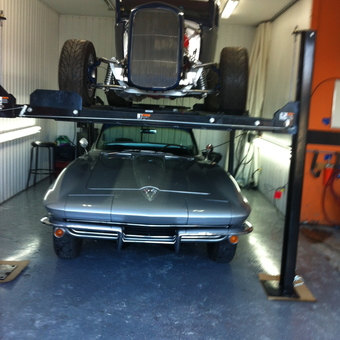 Two Classic Cars on Four Post Lift in Clean Garage - Joanna from St-Jean Richelieu, Quebec