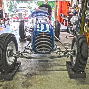 Vintage Race Car in Organized Garage - Swivel Hips from Franklin, WI
