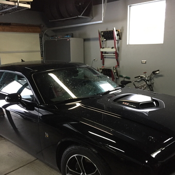 Organized garage with overhead storage and cabinets - BOOST from New Lenox, IL