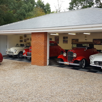 Classic Car Garage With Wall Art and Checkered Flooring - Limey Trucker London from Basildon, Essex United Kingdom