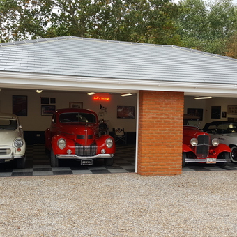 Classic Car Garage with Wall Decor and Neon Sign - Limey Trucker London from Basildon, Essex United Kingdom