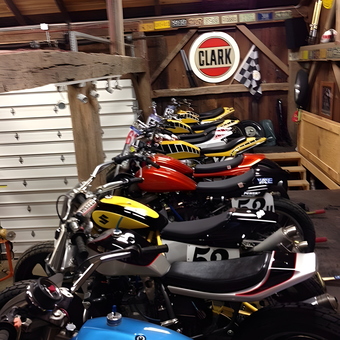 Vintage Motorcycles and Garage Decor with Clark Sign - Team Slideways