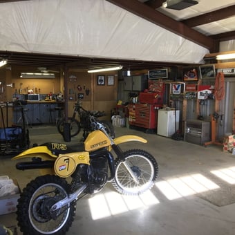 Organized garage with motorcycle, tool chests, and wall storage - Lcooper58 from Oklahoma City, Oklahoma