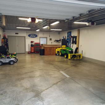 Organized Garage with Tool Storage and Lawn Tractor - Bud from Springville, New York