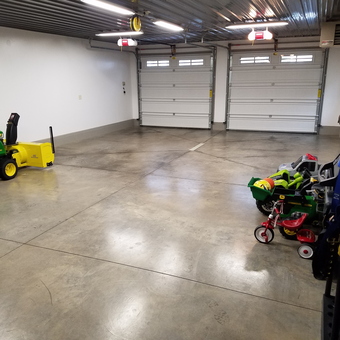 Spacious garage with lawn tractor and toys - Bud from Springville, New York