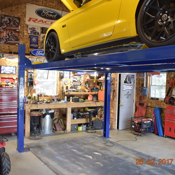 Garage With Car Lift, Tool Cabinets, and Wall Signs - Paul from Augusta, Maine