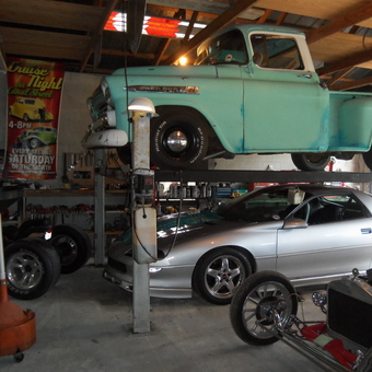 Classic Truck on Car Lift with Sports Cars - Pat from Edgewater, Fla