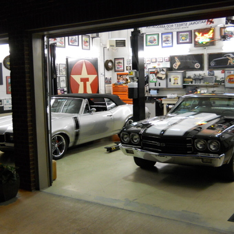 Classic Car Garage with Texaco Sign and Wall Art - The Butcher Shop from Kingsport, Tn