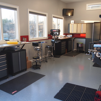 Organized garage with tool cabinets and workbenches - David from Moorseville, NC