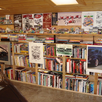 Custom garage library with car memorabilia and wall art - AV8Roadster from Mission, British Columbia