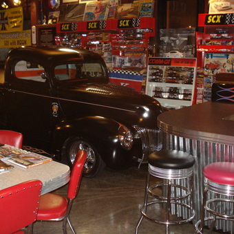 Classic Car Garage with Bar Stools and Diecast Displays - AV8Roadster from Mission, British Columbia
