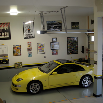 Organized garage with yellow sports car and wall decor - Aaron from Farmington, UT