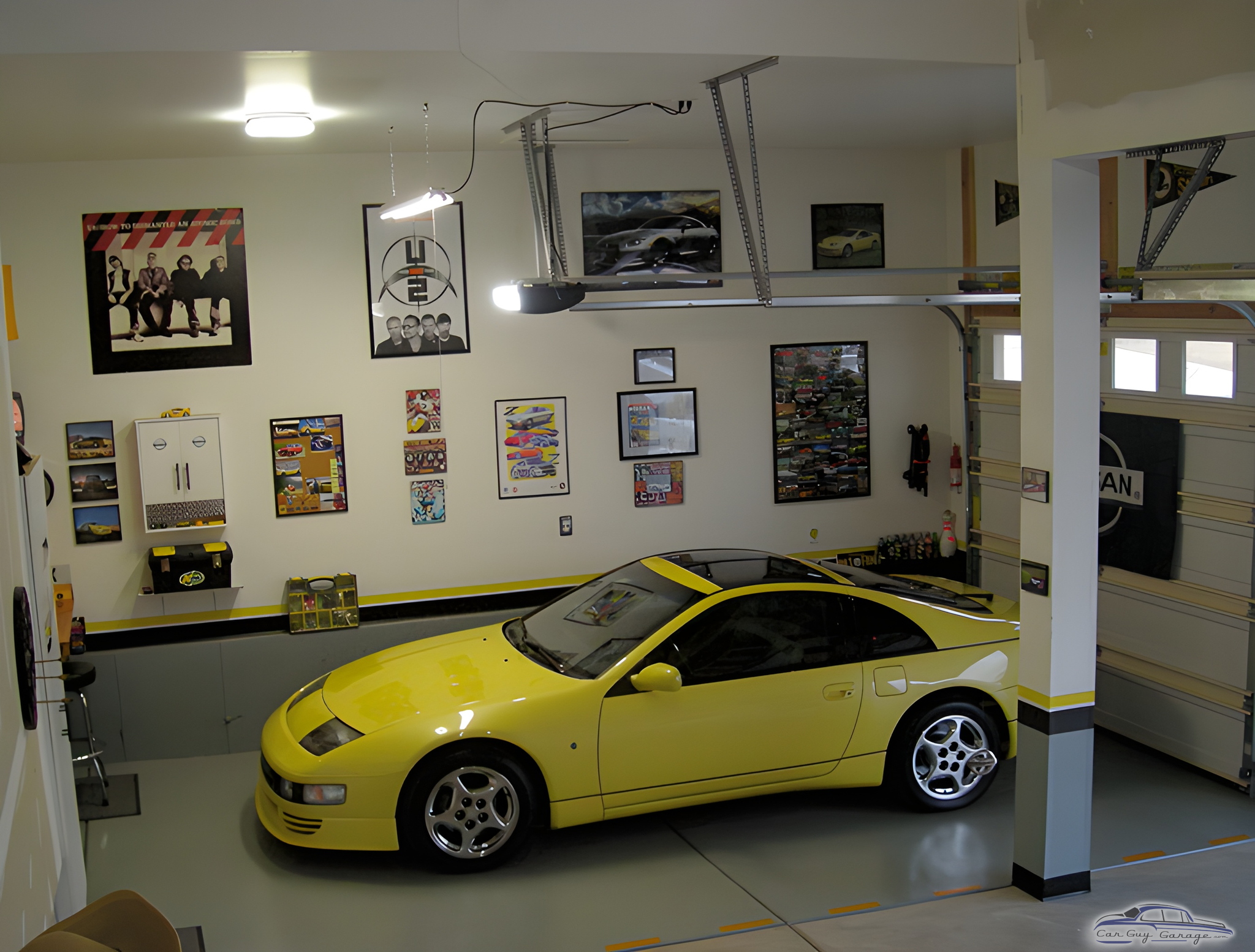 Organized garage with yellow sports car and wall decor - Aaron from Farmington, UT