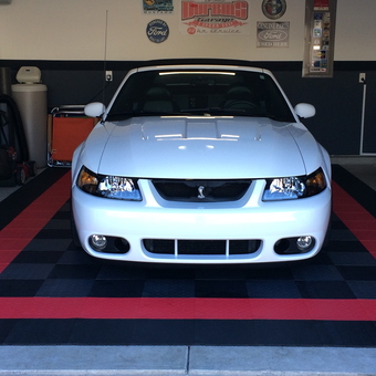 Garage with Checkered Tile Flooring and White Car - Christopher Durbin from Summerville, South Carolina