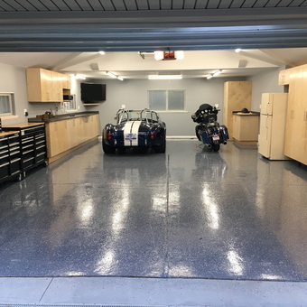 Organized garage with tool chests, cabinets, and epoxy floor - Bob from Royal Oak, MI