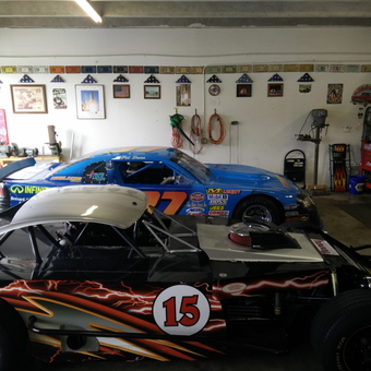 Race Cars, Tools, and Wall Decor in Garage - Dogman