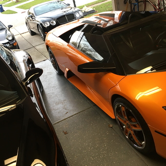 Luxury Cars in Organized Garage - Abreumotors from Carmel, Indiana