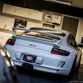 Organized garage with Porsche GT3 and cabinets - Abreumotors from Carmel, Indiana