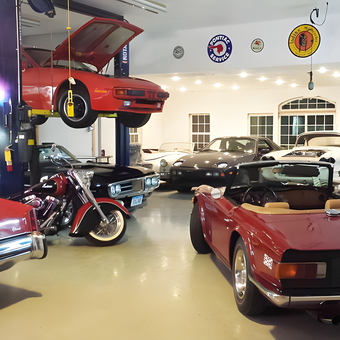 Classic Car Garage with Lift, Signs, and Motorcycle - GarageMahal from Nevada, Iowa
