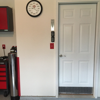 Garage Door Entry with Metal Trim and Tool Storage - Nitram from Noblesville, Indiana
