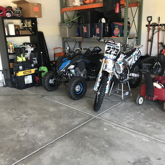 Organized garage with shelving, ATV, and dirt bike - Randy from Lockport, IL