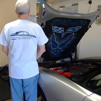 Organized garage with custom Corvette hood art - Dominic from Hurst, TX