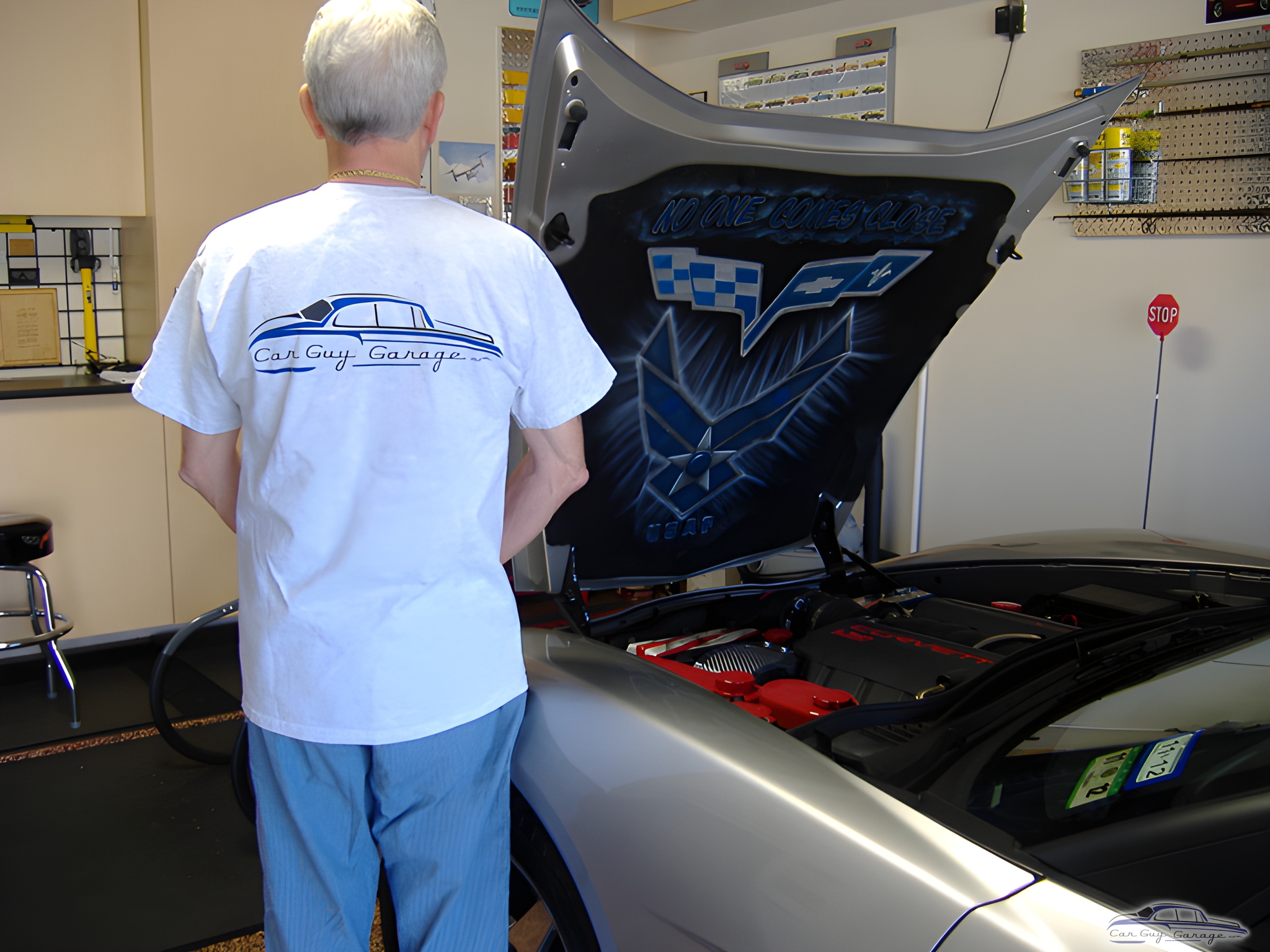 Organized garage with custom Corvette hood art - Dominic from Hurst, TX