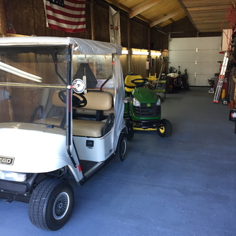 Organized garage with golf cart and mower - Wilson Jones from Hutto, Tx