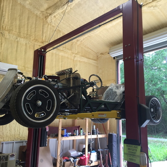 Car Lift with Classic Car Frame in Organized Garage - Bob from Onalaska, Texas