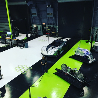 Modern garage with sports car, motorcycles, and tool storage - Shanon Parker from Port Canaveral, Fl