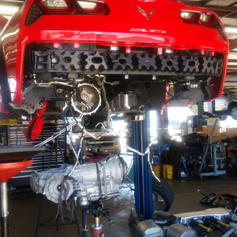 Red Corvette on Lift with Transmission Removal - Shannon from Moss Point, Mississippi
