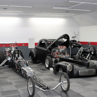 Custom Dragster, Classic Car, and Motorcycles in Modern Garage - Z