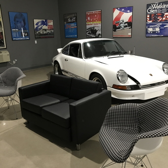 Garage with Classic Porsche, Modern Sofa, and Accent Chairs - Kevin