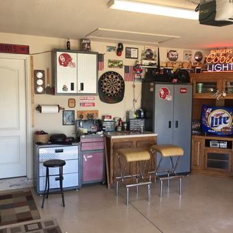Garage with Metal Cabinets, Bar Stools, and Neon Signs - Swag Dad from Norman, OK