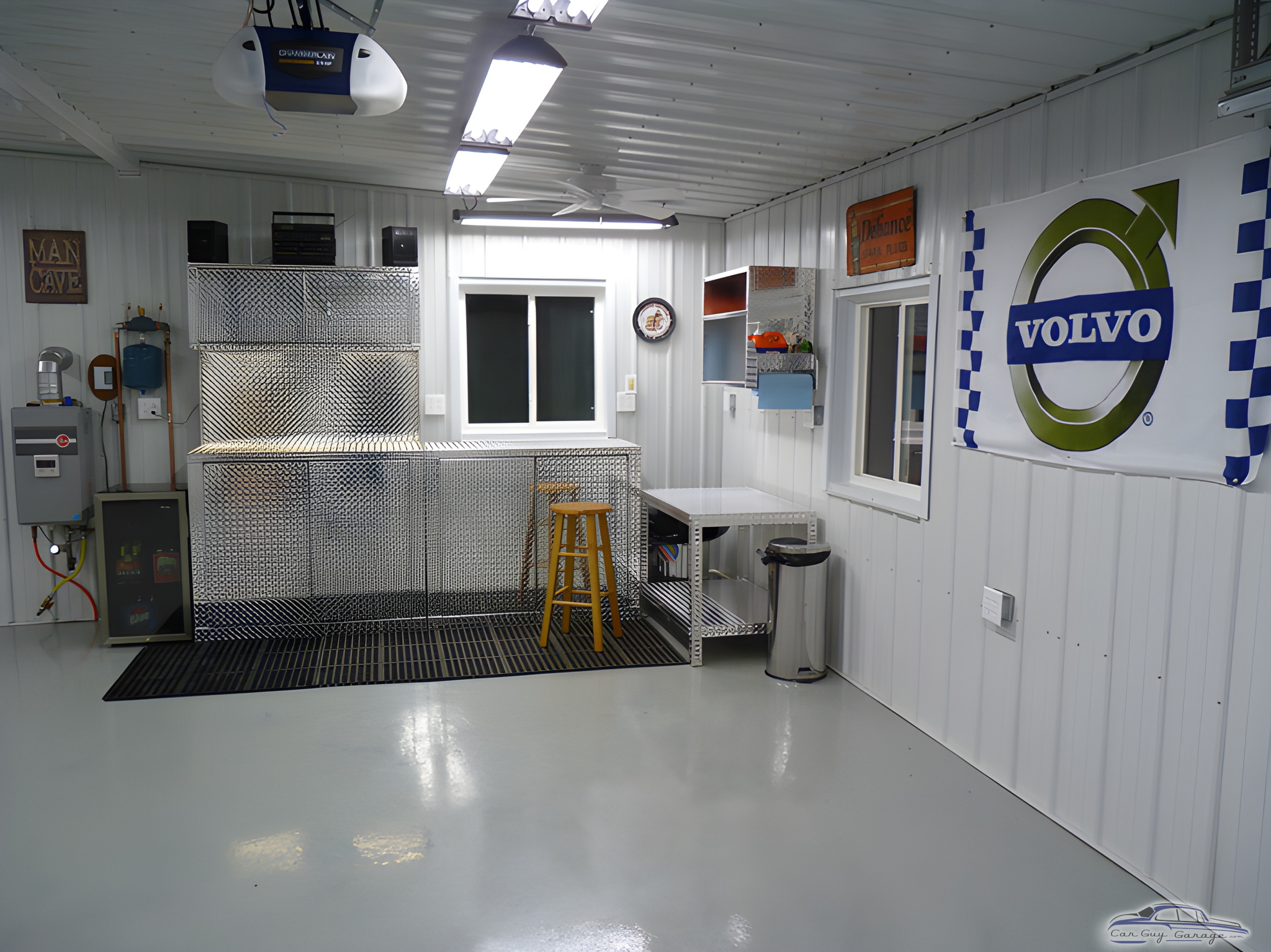 Organized garage with diamond plate cabinets and Volvo sign - Dave from Marshalltown, IA