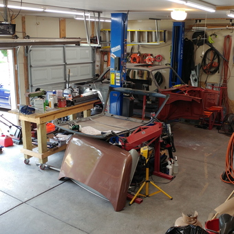 Organized garage with car lift, workbench, and tools - Dave G from West Chester, Ohio